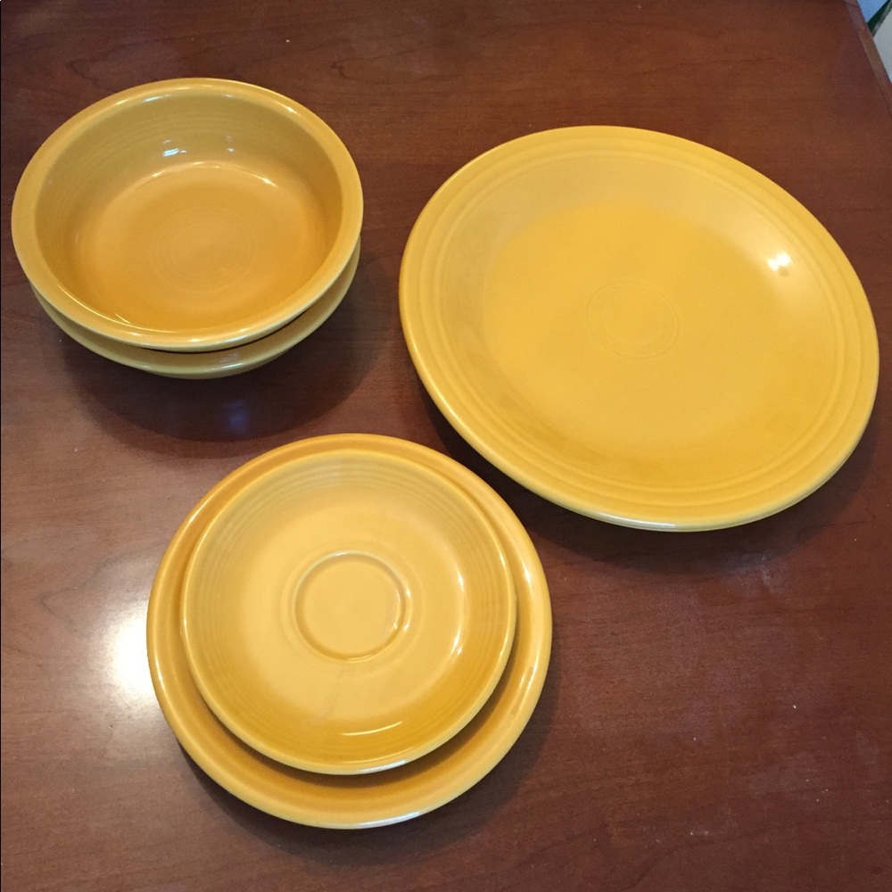 Fiestaware Marigold plates and cereal bowls
